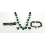 Silver malachite jewellery comprising large bead necklace, bracelet with heart shaped padlock, one