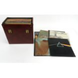Box of assorted LP records including Eric Clapton, Queen, Fleetwood Mac, etc