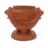 Oriental Chinese terracotta urn with embossed dragons and dog of Foo handles, 24cm high Generally