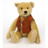 1925 replica Steiff teddy BU, numbered 1582, with certificate, original label and bag, 30cm high