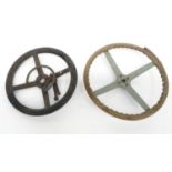 Two vintage car steering wheels, the larger 46cm diameter