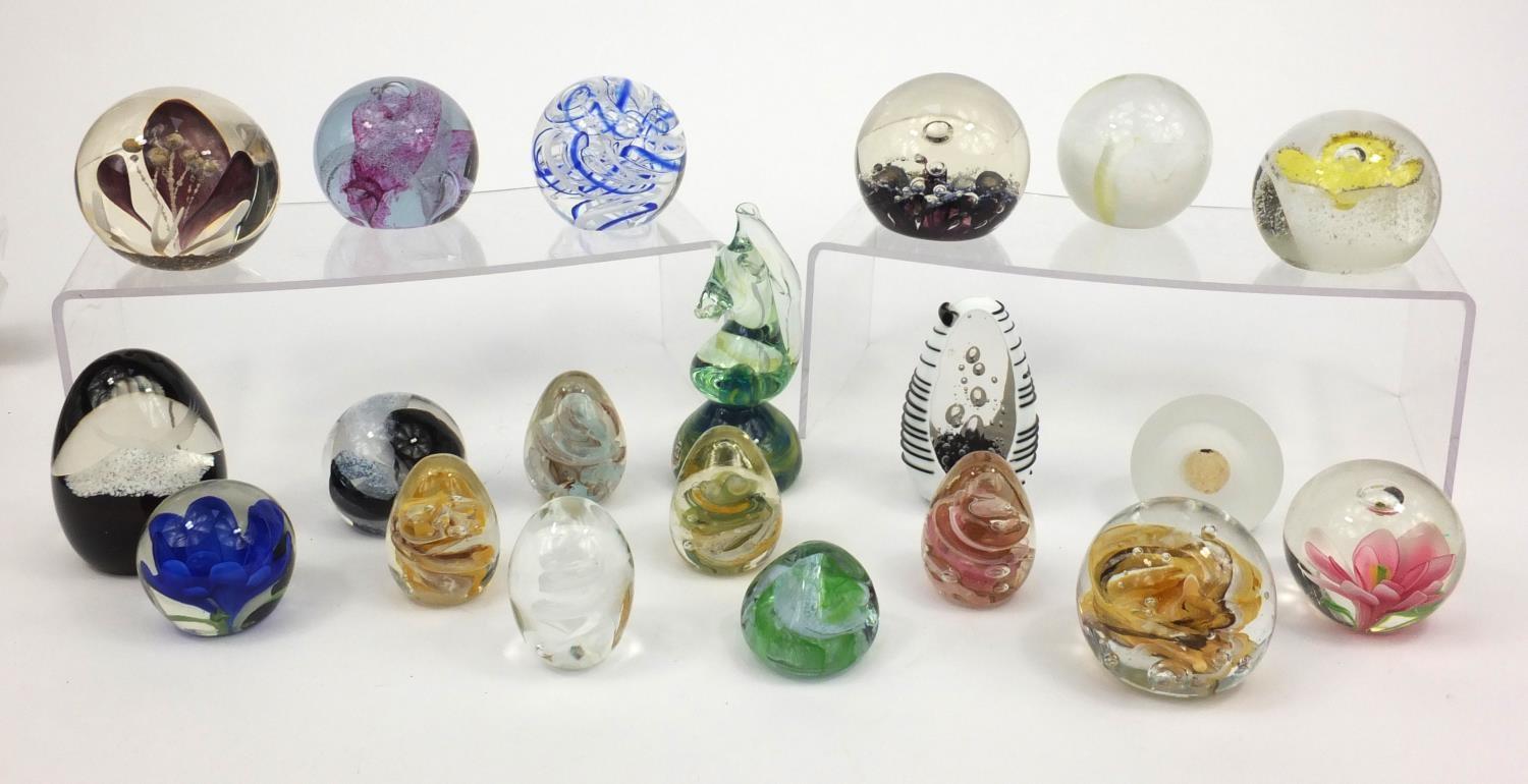 Group of colourful glass paperweights including Selkirk, Langham, Isle of Wight and Caithness