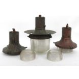 Three vintage industrial light fittings with glass diffusers, the largest 54cm high, together with