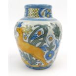 Continental Maiolica pottery vase hand painted with deer amongst flowers, 23cm high In generally