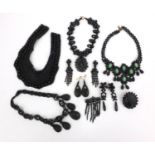 Collection of jet and similair jewellery comprising four necklaces, brooch with matching earrings