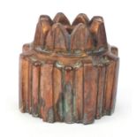 Victorian copper jelly mould, stamped '319', 12cm high