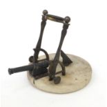 19th Century marble and bronze noon cannon with hours and co-ordinates, the marble base 20cm