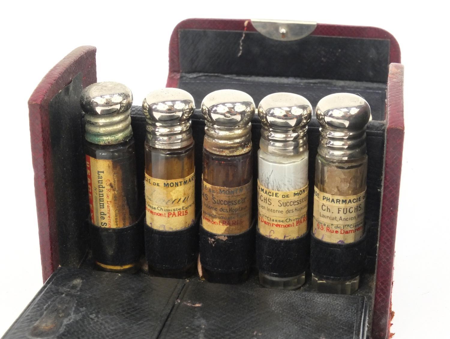 French doctor's red leather travelling case housing a selection of glass bottles, spoon, penknife - Image 2 of 5