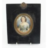 Miniature watercolour of a young girl, G. Soyet , mounted in a black wooden frame, 7.5cm high