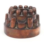 Victorian copper jelly mould, stamped 73, 10cm high