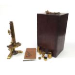 19th Century J.B. Dancer of Manchester double pillar brass microscope, together with fitted mahogany