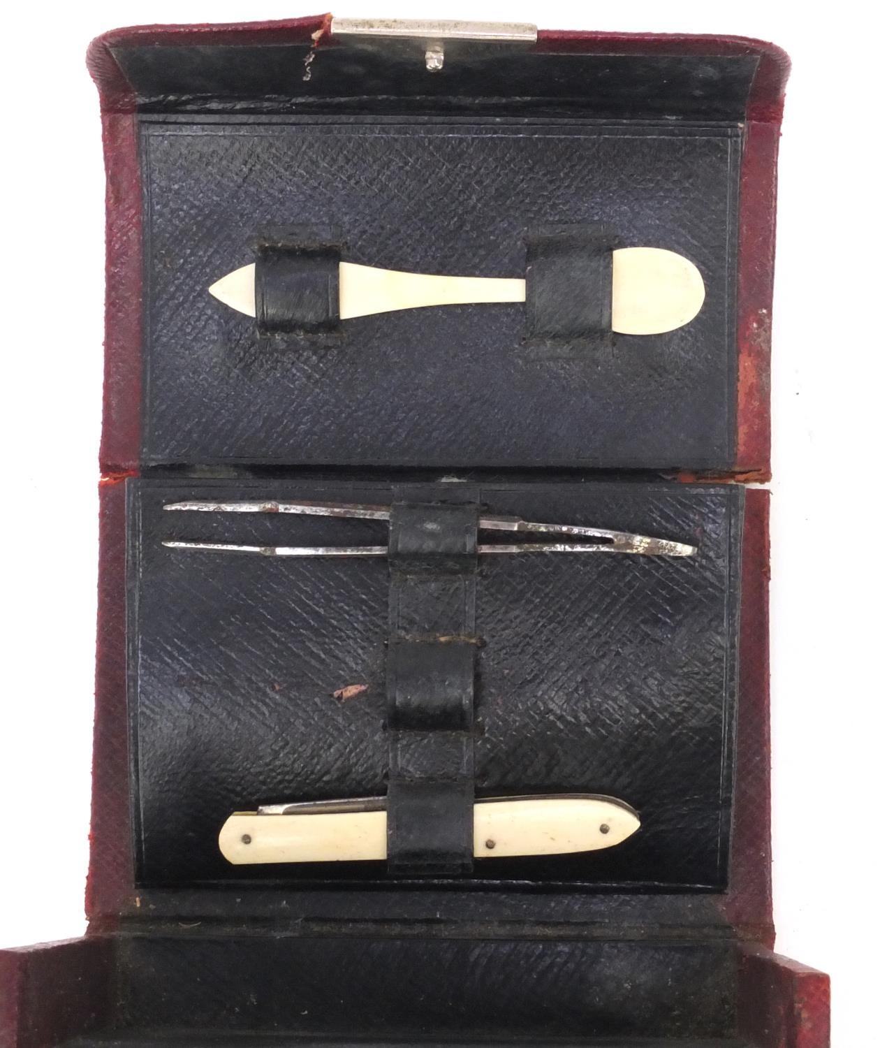 French doctor's red leather travelling case housing a selection of glass bottles, spoon, penknife - Image 3 of 5