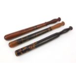 Three hand painted wooden truncheons - one with a coat of arms, the largest 46cm long