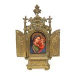 Victorian religious brass easel frame inset with a hand painted porcelain plaque of Madonna and