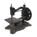 Victorian cast iron sewing machine with gilt decoration, 31cm high :To Request a Condition Report