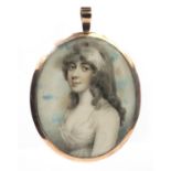 19th century oval portrait miniature of a lady wearing a white dress onto ivory, housed in an