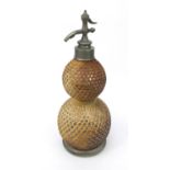 Wicker bound double gourd shaped glass soda syphon, 49cm high :To Request a Condition Report