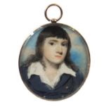 Antique oval portrait miniature of a young boy onto ivory, housed in an unmarked gold mourning