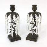 Pair of French empire bronze candlesticks with glass drops, each 23.5cm high :To Request a Condition