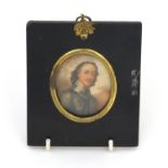 19th century oval portrait miniature of a soldier in uniform onto ivory, housed in an ebonised frame