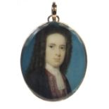 19th century oval portrait miniature of a gentleman wearing a black jacket onto ivory, housed in a