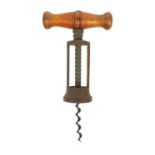 Cast iron wooden handled corkscrew, 18cm when closed : For Condition Reports Please visit www.