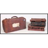 A good collection of vintage leather suitcases - travel trunks to also include attache cases and a