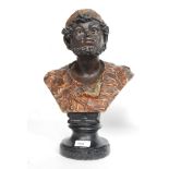 A late 19th / early 20th century  plaster bust study of a blackamoor being set on plaster ebonised