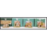 LILLIPUT LANE: A collection of 4x green boxed Lilliput Lane ceramic cottages - 794 Penny's Post,