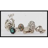 A collection of 6 silver 925 rings to include moonstone set, turquoise set, , lattice work,