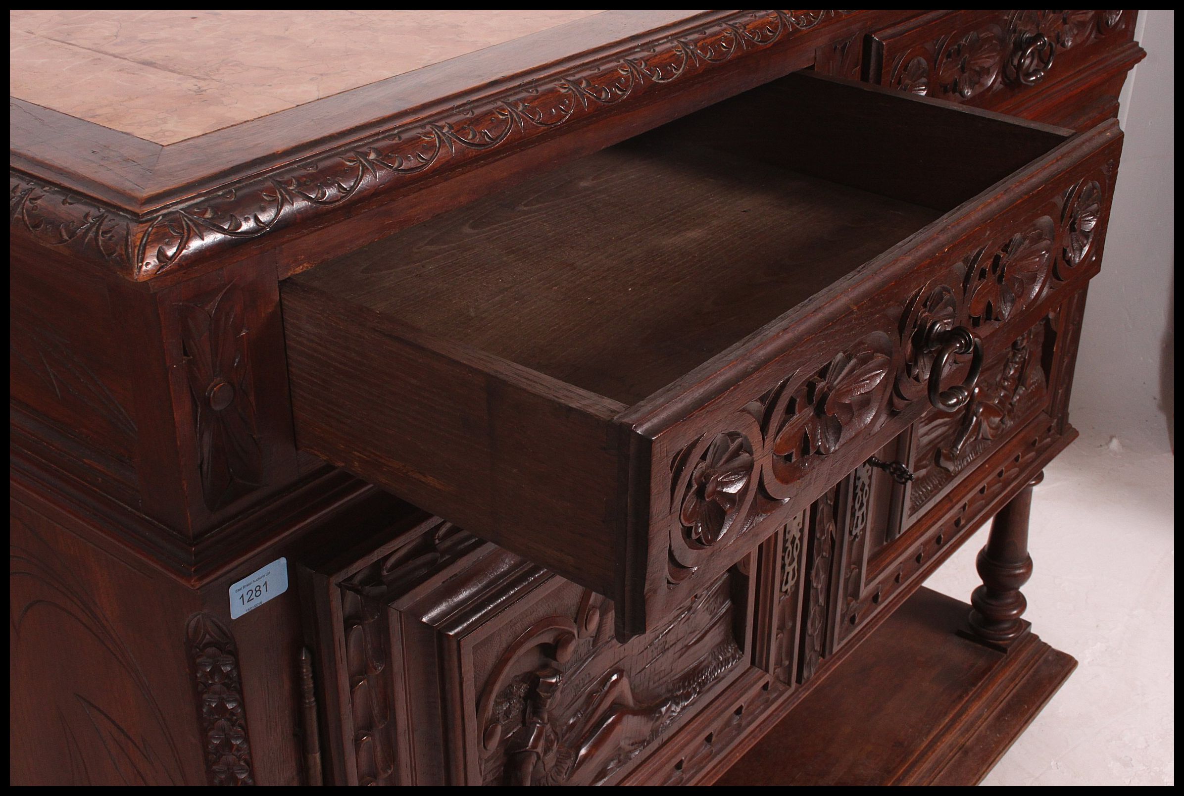 A 19th century Jacobean carved oak green man revival marble top sideboard / buffet. - Image 5 of 6