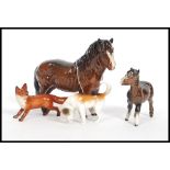 A collection of Beswick figurines to include fox, hound, horse and a Shetland pony.