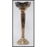 A silver hallmarked flower vase with scalloped bowl Hallmarked for Sanders & Mackenzie -Ernest