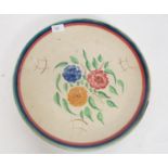 A large Shorter & Sons ceramic charger  decorated with a floral spray to centre with banded borders