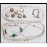 A group of silver jewellery items to include necklaces, bracelets, ring, lockets and pendants.