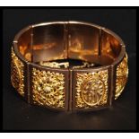 A Chinese gold bracelet bearing Chinese makers marks with English Assay office 375 / 9ct gold