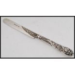 A silver hallmarked berry knife.