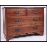 An Edwardian ash / oak wood 2 over 2 cottage chest of drawers.