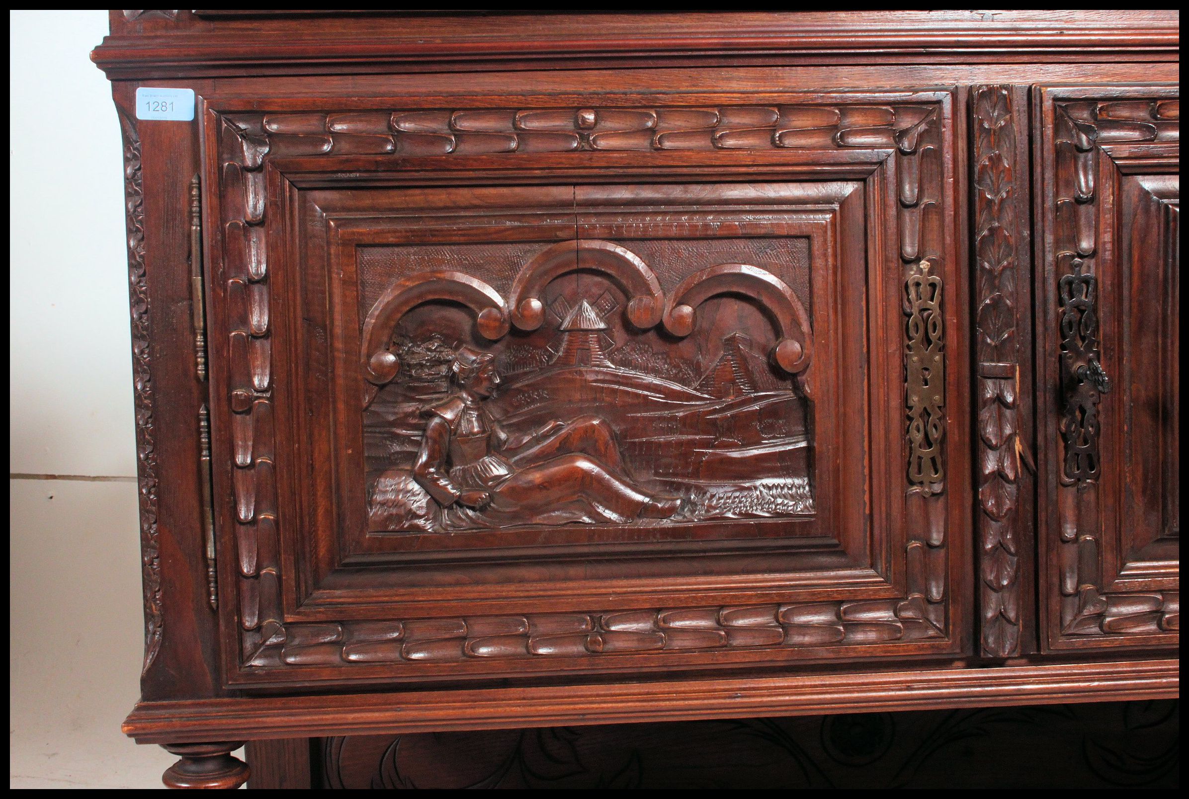 A 19th century Jacobean carved oak green man revival marble top sideboard / buffet. - Image 4 of 6