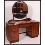 A 1930's Art Deco dressing table chest  of drawers.