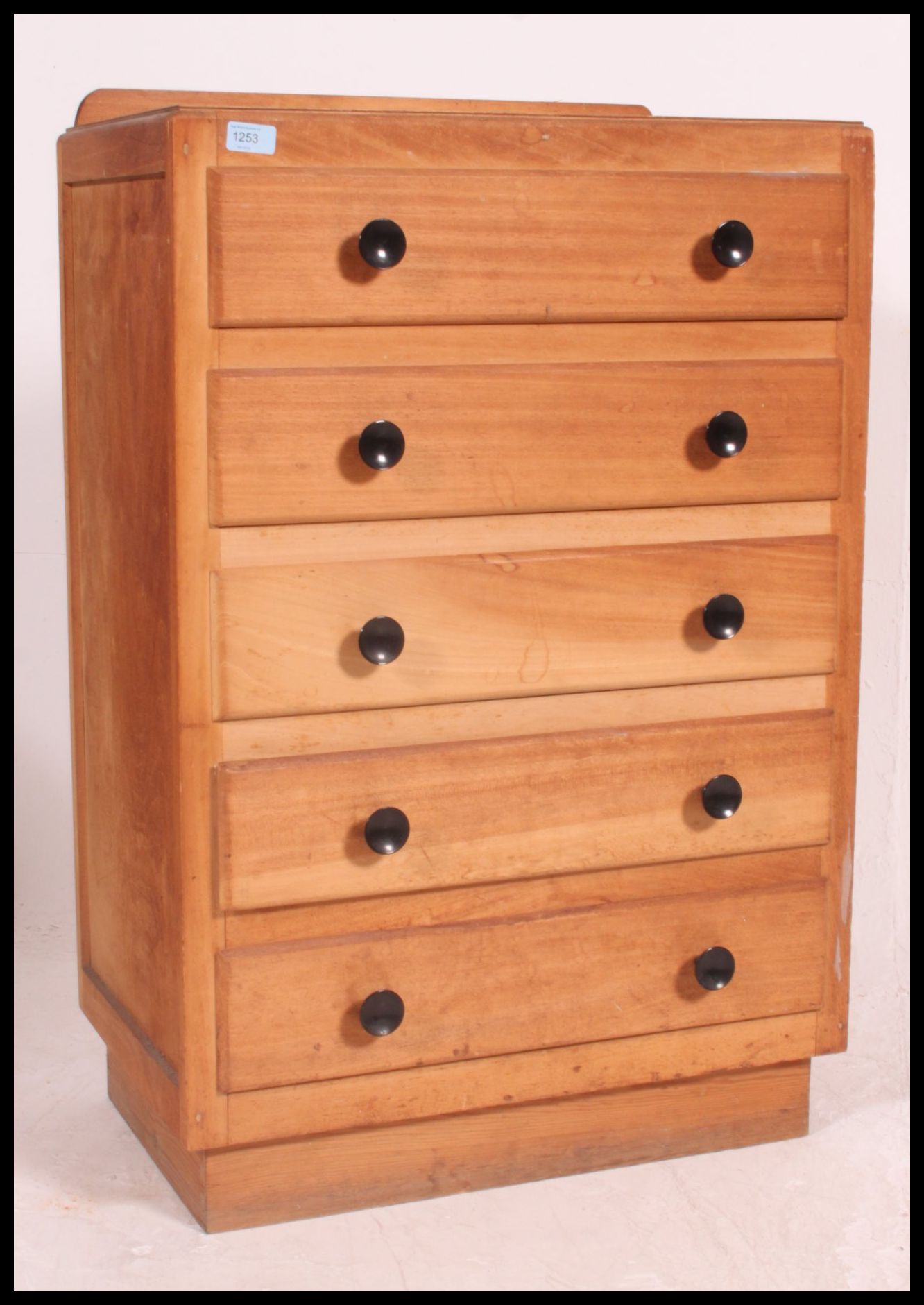A 1930's Art Deco beech wood panel chest of drawers.