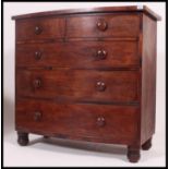 A Victorian mahogany bow front chest of drawers.