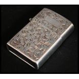 A ladies Silver Zippo style petrol lighter,