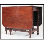 A 19th century Victorian mahogany gate-leg dining table,