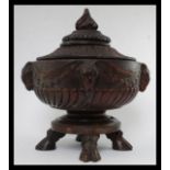 An unusual black forest carved wooden centrepiece / lidded fruit bowl.