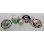 4 19th century ceramic teacups and saucers to include Imari pattern, Chinese, chintz pattern,