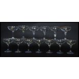 A set of twelve vintage /  retro collectable advertising Babycham glasses,