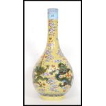 An early 20th century imperial yellow ground bottle vase,