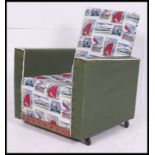 A fabulous retro vintage vinyl upholstered childs arm chair, of angular construction.