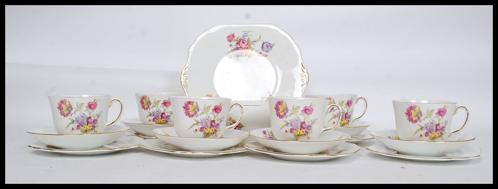 A 20th century Staffords chinta /c floral bone china tea service by Stanley,